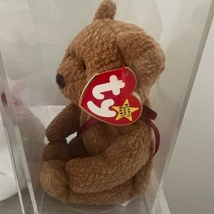 Brown beanie baby brand new and clear plastic box